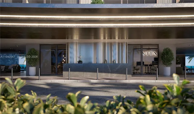 a living room with furniture a window and kitchen