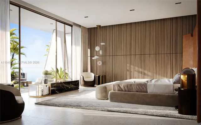 a very nice looking room with a large window and furniture