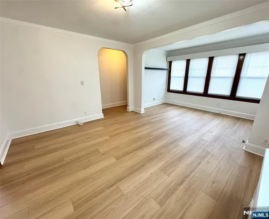 a kitchen with stainless steel appliances granite countertop a refrigerator sink and microwave