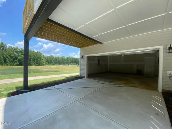 a view of a back yard of a house