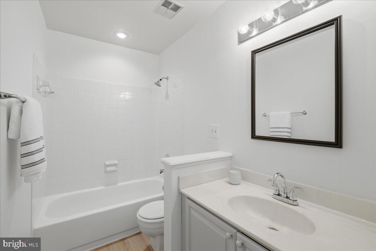 8902 Winding Hollow Way Springfield, VA 22152 - Photo 19 of 34 Modern bathroom with sleek finishes.