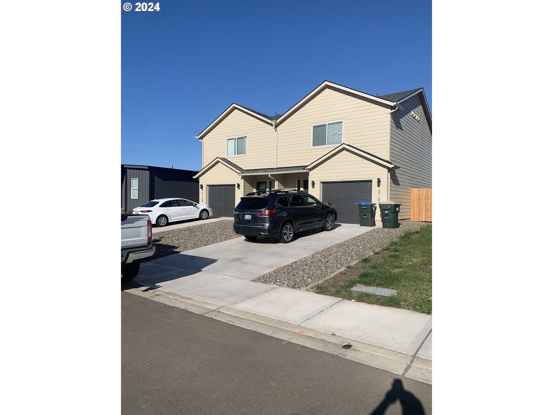 1016 Peach Road Winlock, WA 98596 - Photo 1 of 43 a front view of a house with garage