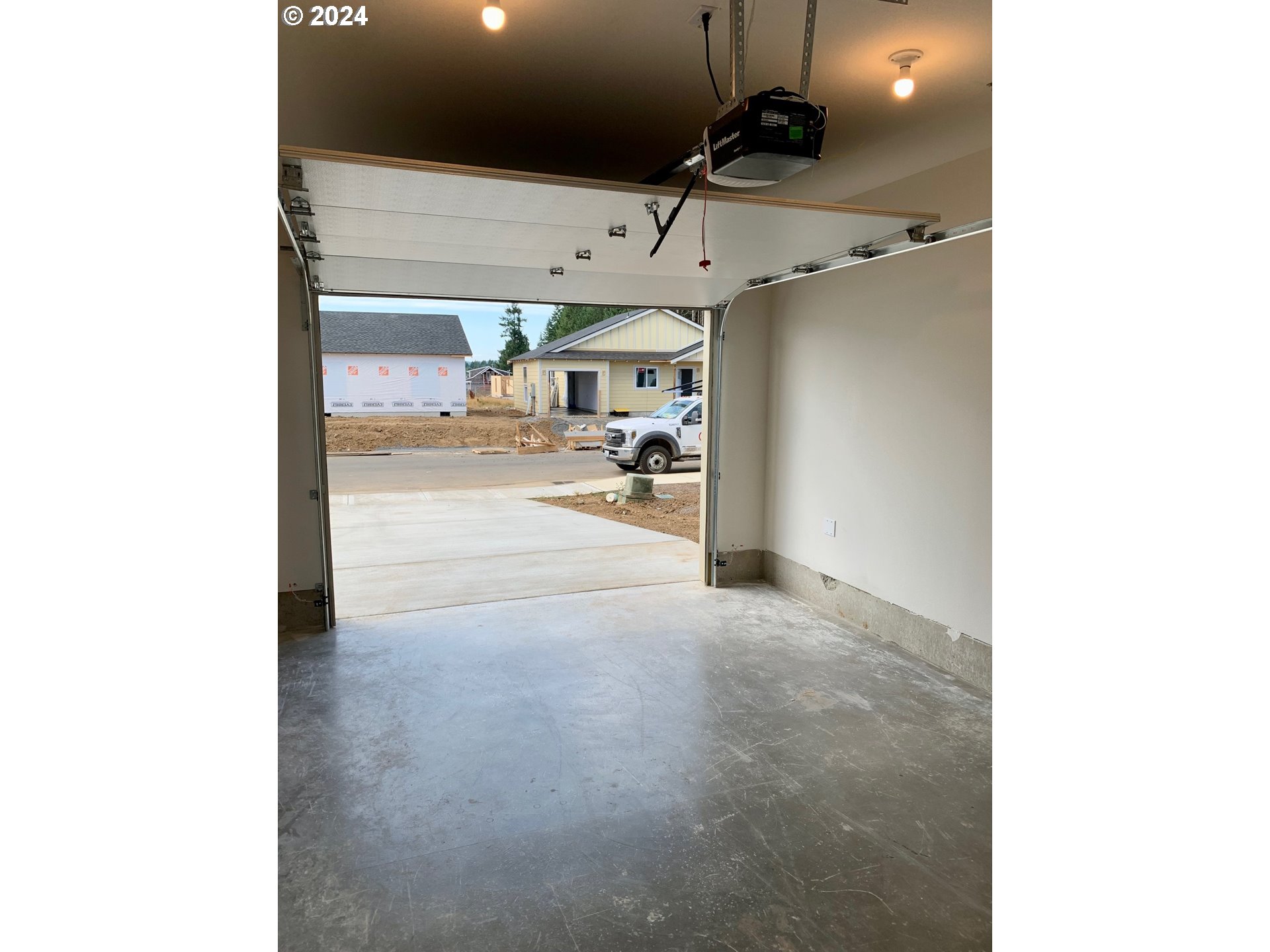 1016 Peach Road Winlock, WA 98596 - Photo 16 of 43 a view of a living room and a garage