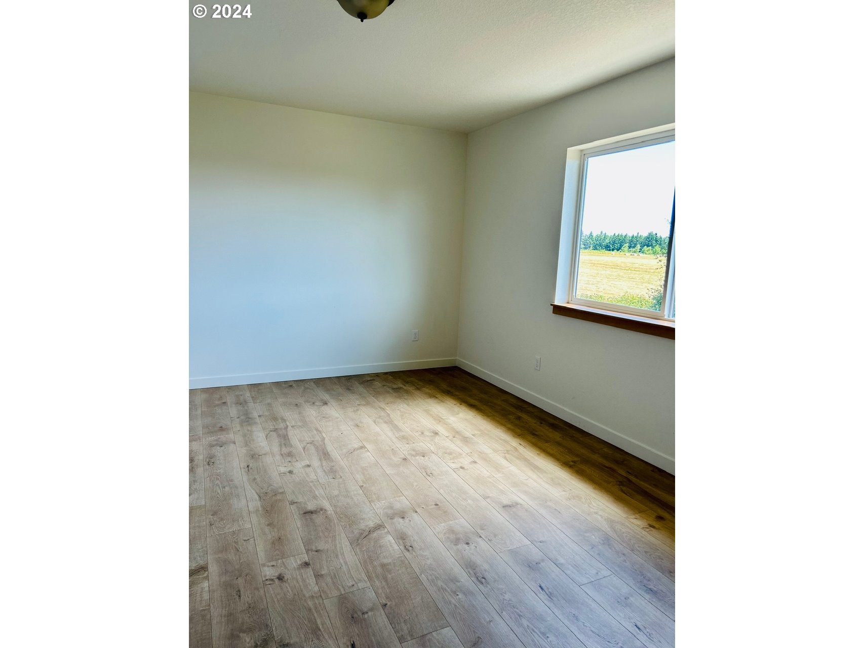 1016 Peach Road Winlock, WA 98596 - Photo 28 of 43 a view of an empty room with a window
