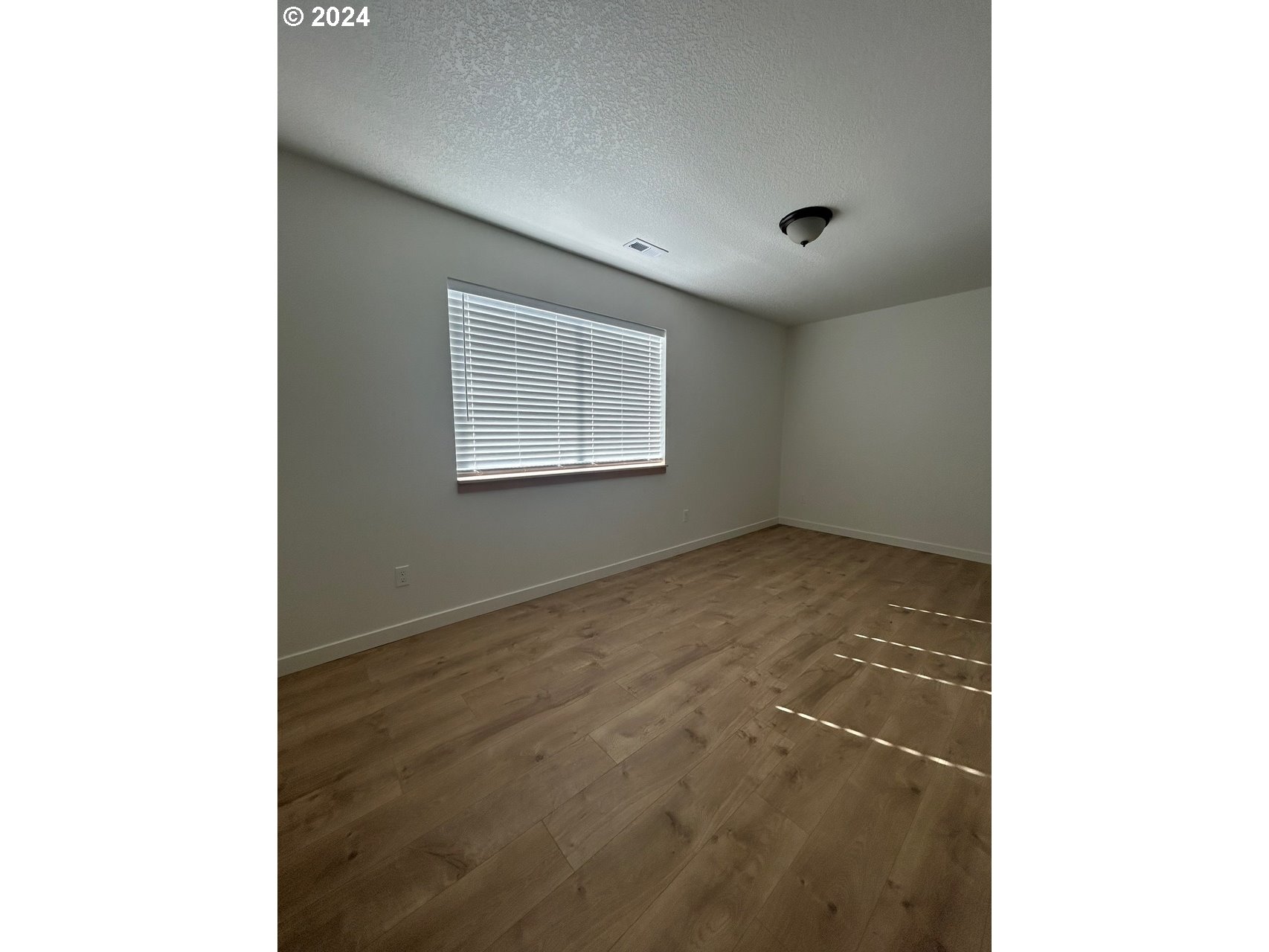 1016 Peach Road Winlock, WA 98596 - Photo 35 of 43 a view of an empty room with a window