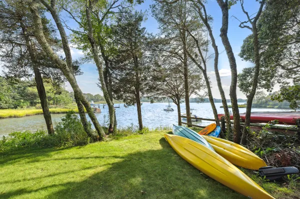 a view of a yard with swimming pool