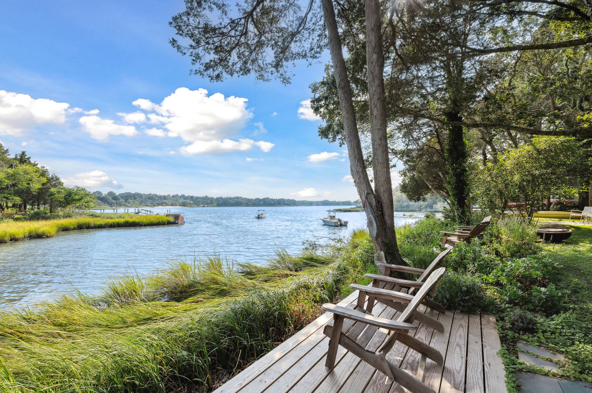 64 Towd Point Road Southampton, NY 11968 - Photo 2 of 21 a view of a lake with a outdoor space
