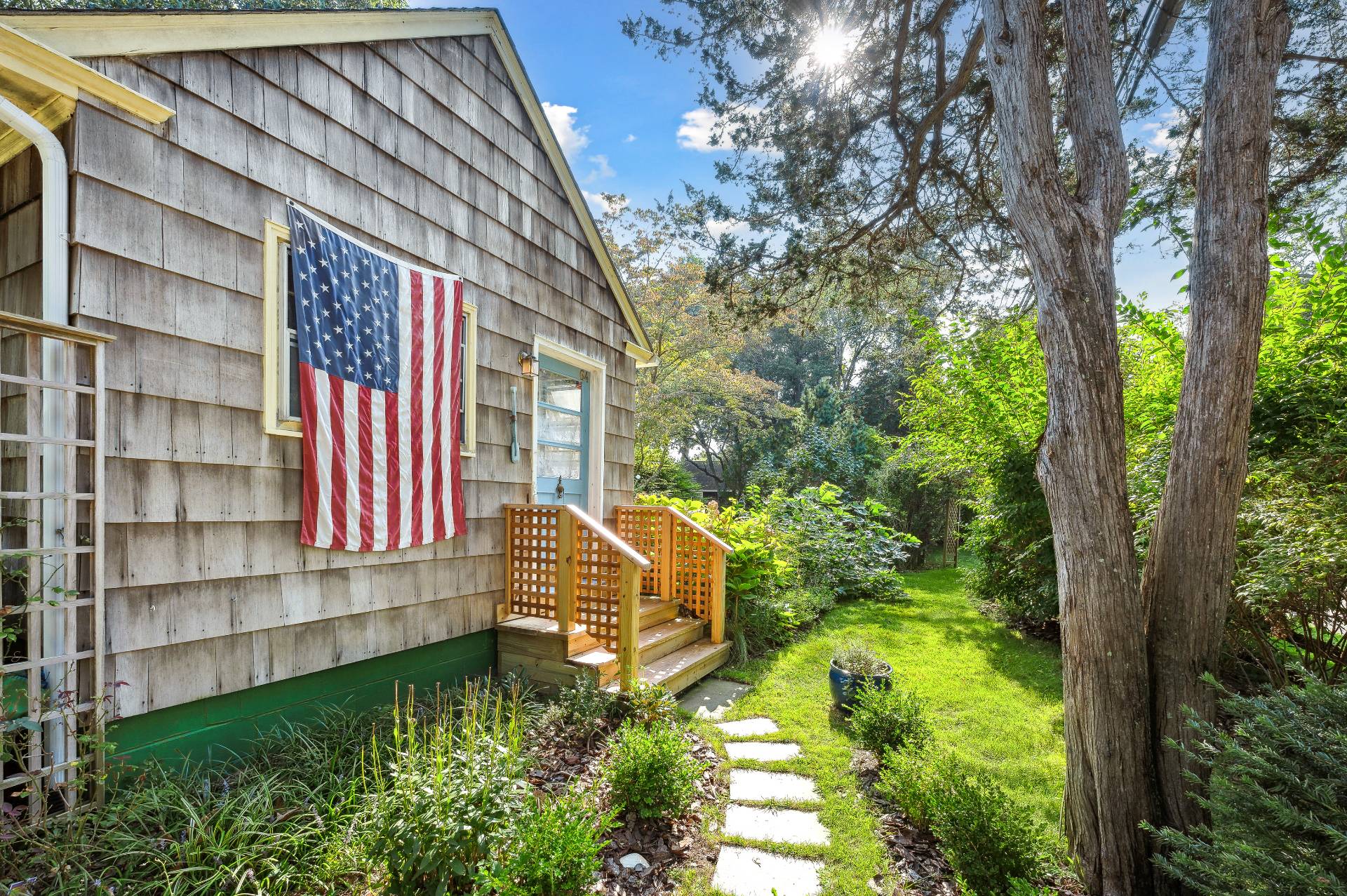 64 Towd Point Road Southampton, NY 11968 - Photo 21 of 21 a bathroom with a sink and garden