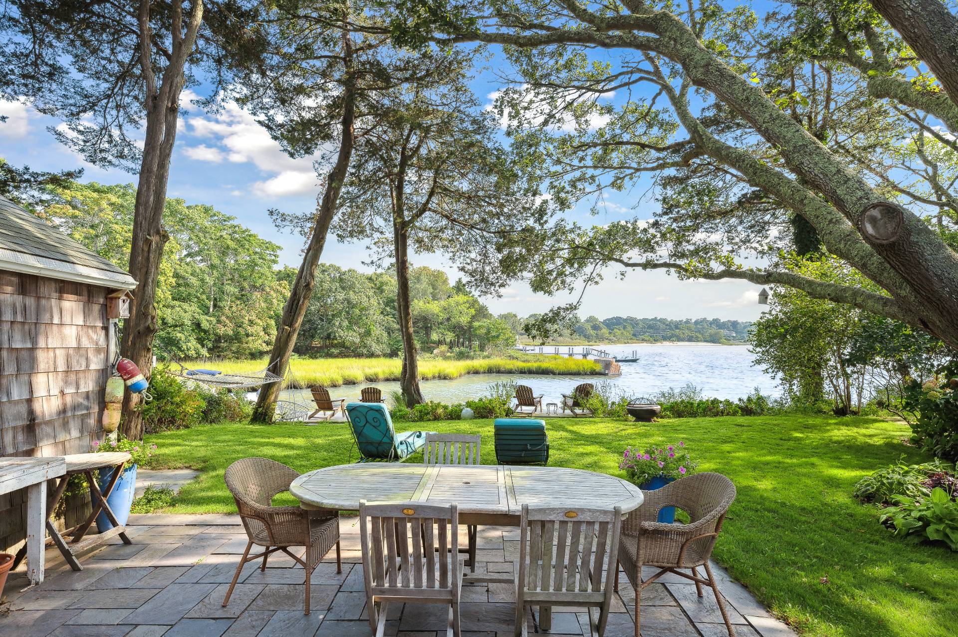 64 Towd Point Road Southampton, NY 11968 - Photo 6 of 21 a view of an outdoor space with furniture and garden