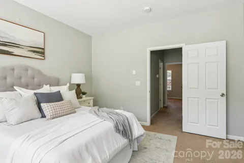 a bedroom with a bed and closet
