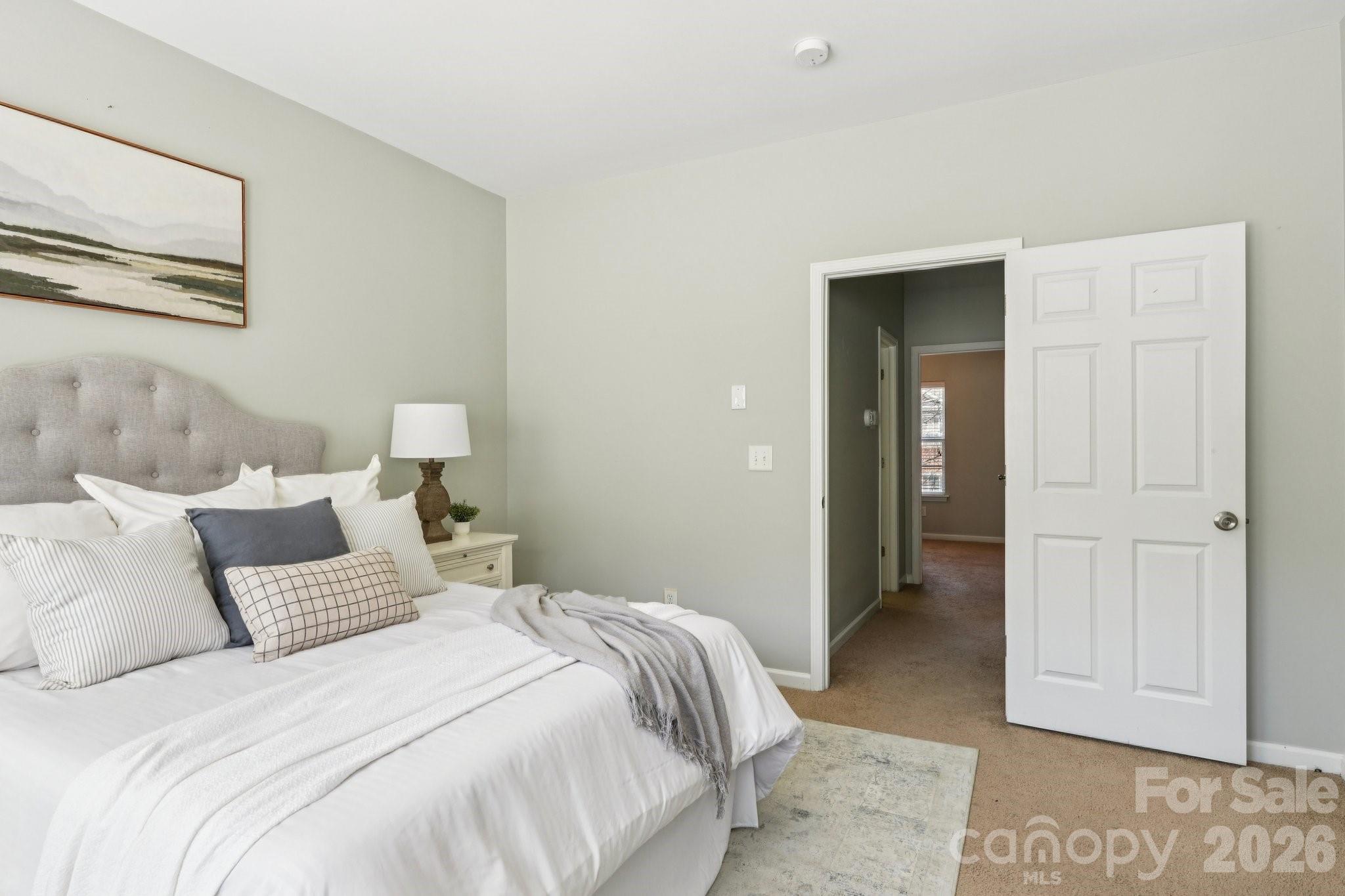 209 Township Drive Fort Mill, SC 29715 - Photo 12 of 31 a bedroom with a bed and closet