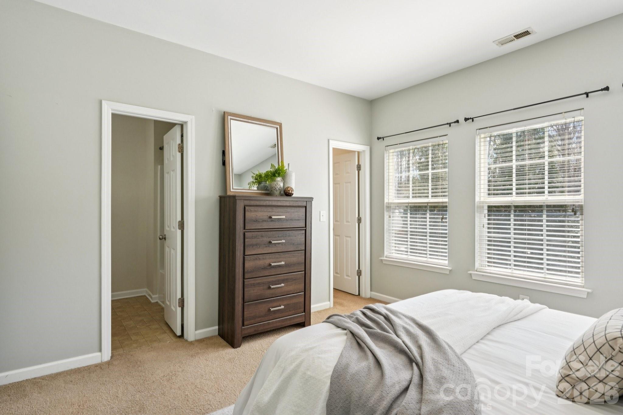 209 Township Drive Fort Mill, SC 29715 - Photo 13 of 31 a bedroom with a bed and a window