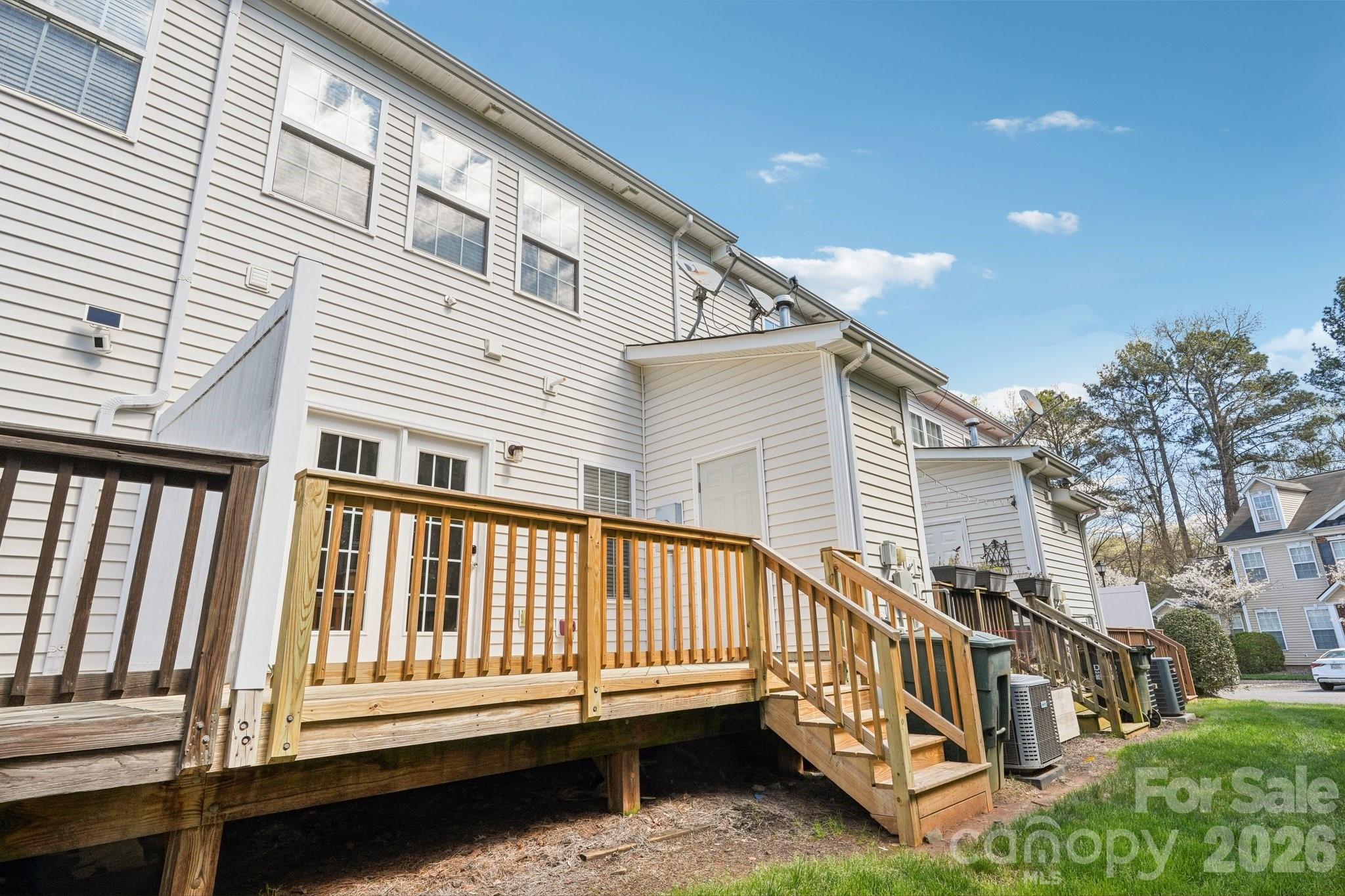 209 Township Drive Fort Mill, SC 29715 - Photo 22 of 31 a view of a house with a small deck