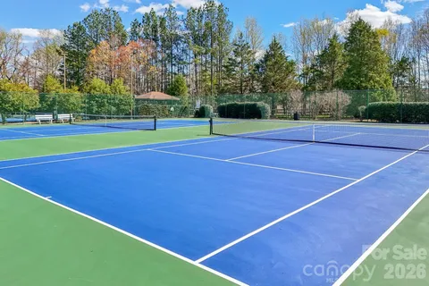 a view of outdoor space and tennis court