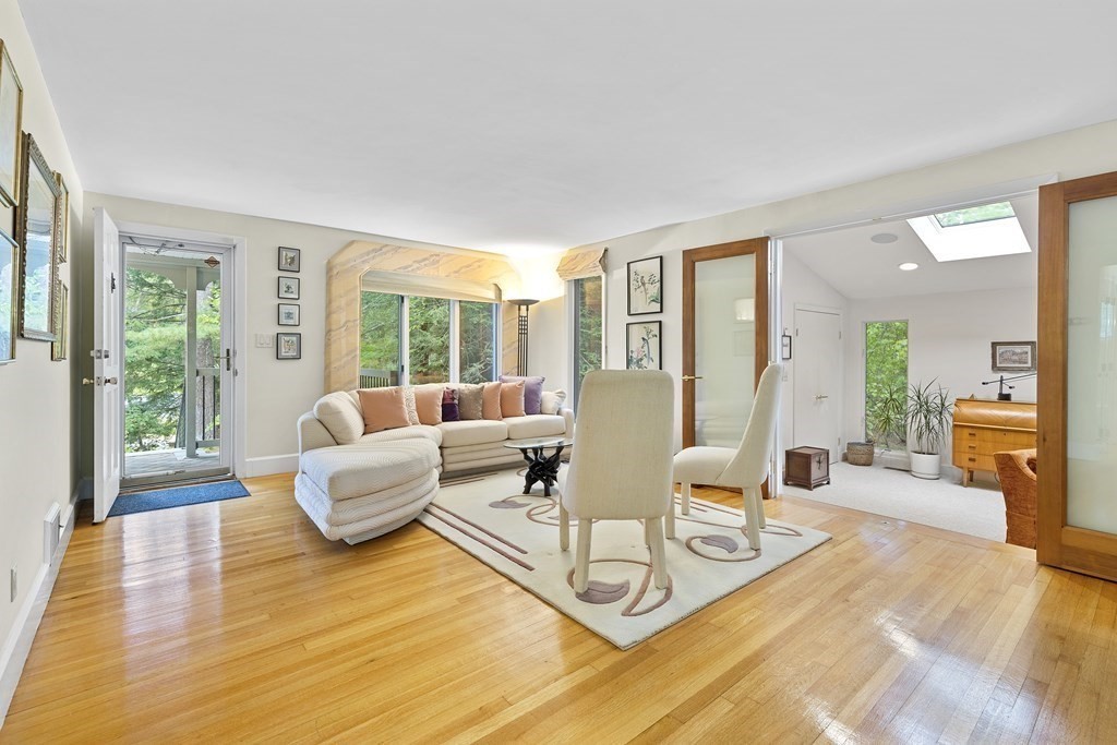 89 Edmands Road Framingham, MA 01701 - Photo 4 of 42 a living room with furniture and large windows