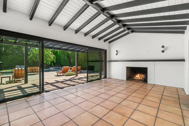 a view of a hallway with windows