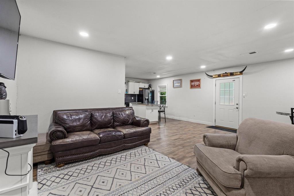 221 Braz Street Bonham, TX 75418 - Photo 9 of 26 a living room with furniture and a couch