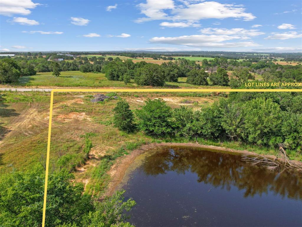Lot 36 Kilkenny Road Poolville, TX 76487 - Photo 4 of 16 a view of an ocean and a mountain