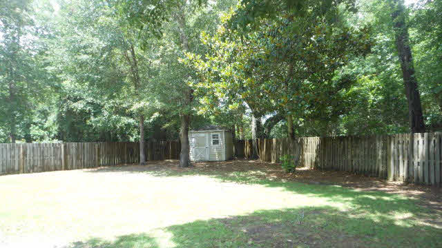7226 Raintree Lane Gulf Shores, AL 36542 - Photo 7 of 14 Shed in Backyard