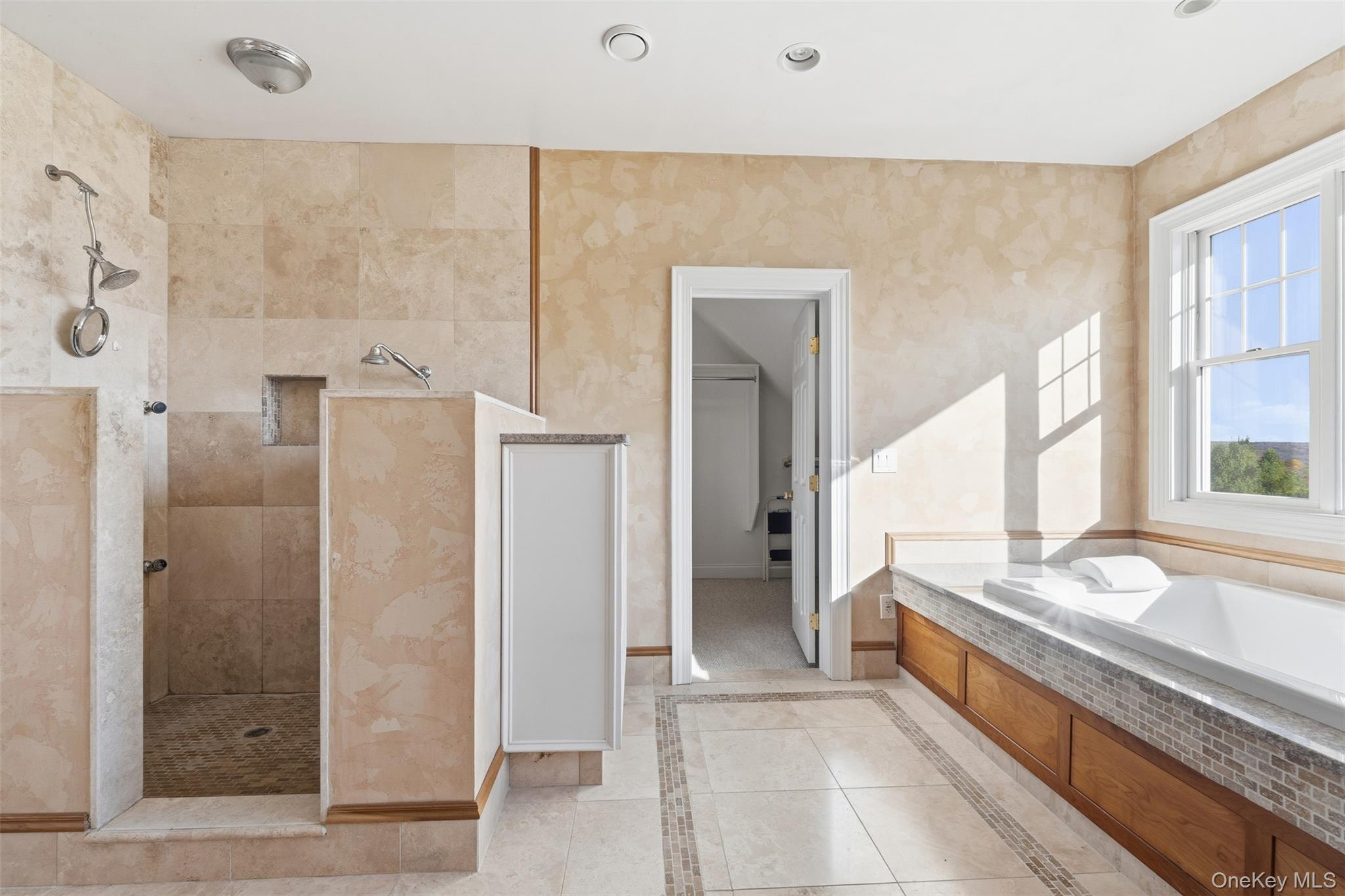 78 Baldwin Road Patterson, NY 12563 - Photo 27 of 50 a spacious bathroom with a granite countertop bathtub and shower