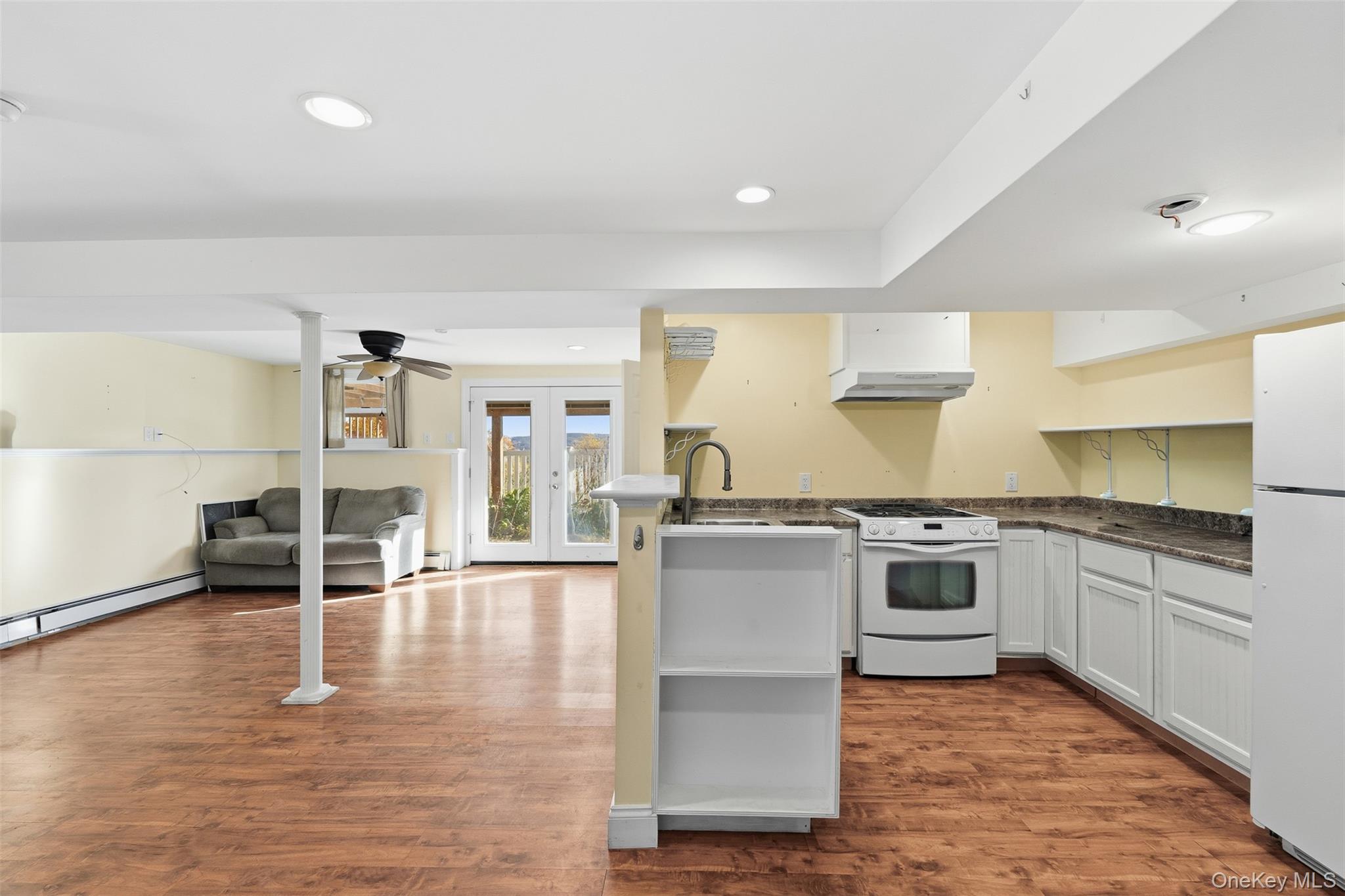 78 Baldwin Road Patterson, NY 12563 - Photo 35 of 50 a kitchen with granite countertop a stove a sink and a refrigerator