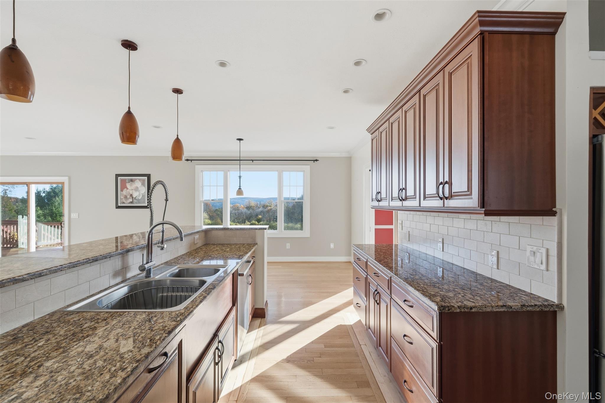 78 Baldwin Road Patterson, NY 12563 - Photo 9 of 50 a kitchen with granite countertop a sink and a stove
