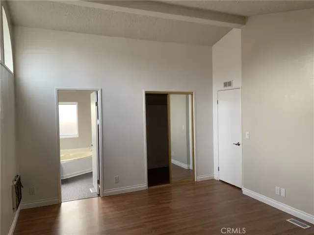 a view of a livingroom with wooden floor