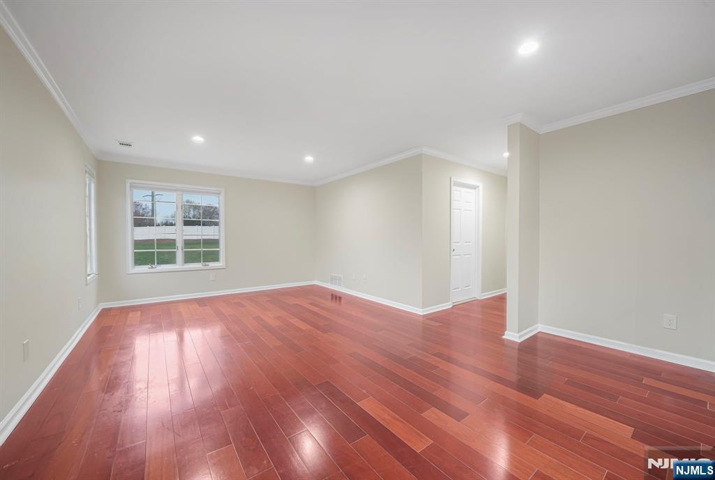 67 Davenport Road Montville, NJ 07045 - Photo 14 of 32 a view of an empty room with wooden floor and a window