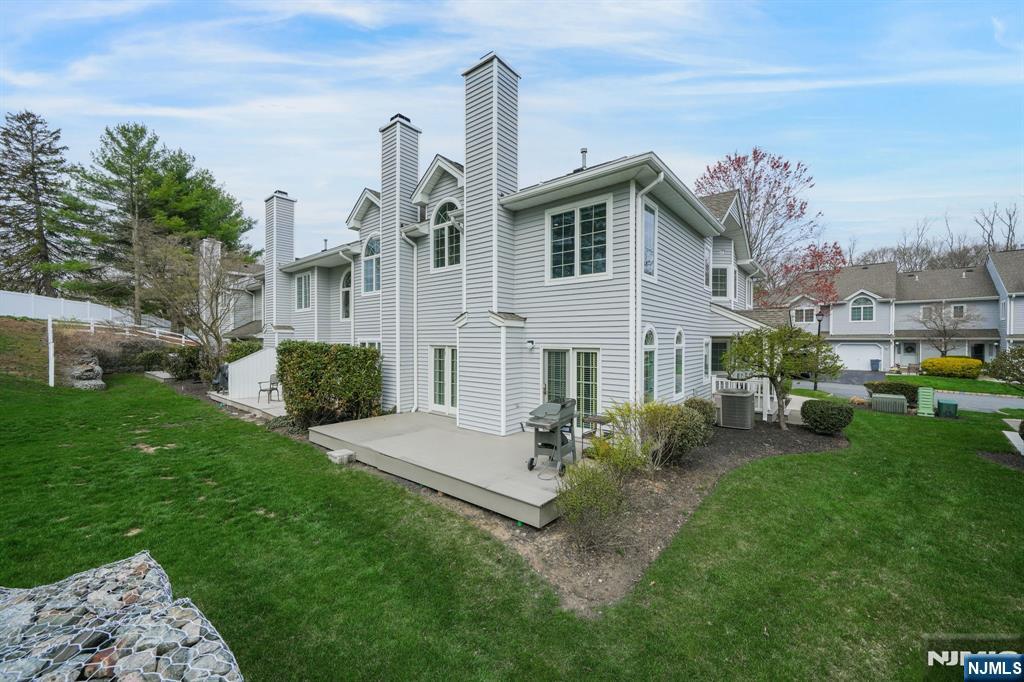 67 Davenport Road Montville, NJ 07045 - Photo 29 of 32 a view of a house with backyard and garden