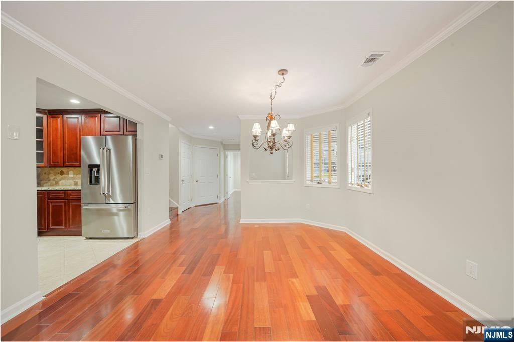 67 Davenport Road Montville, NJ 07045 - Photo 5 of 32 a view of livingroom with hardwood floor and kitchen view