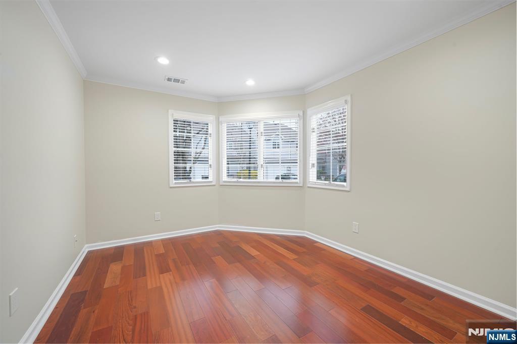 67 Davenport Road Montville, NJ 07045 - Photo 9 of 32 a view of empty room with wooden floor and fan