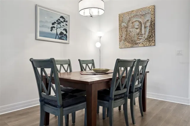 a view of a dining room with furniture