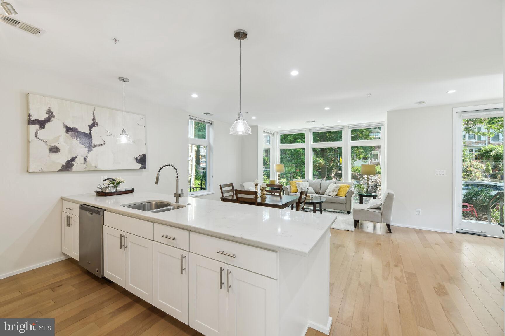 129 Varnum Street Northwest, Unit 1 Washington, DC 20011 - Photo 2 of 22 Stunning modern kitchen with beautiful island.