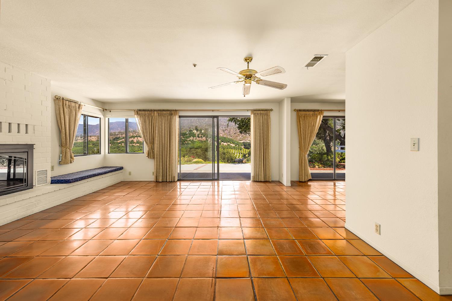 534 Fairview Road Ojai, CA 93023 - Photo 9 of 20 a view of an empty room with a fireplace
