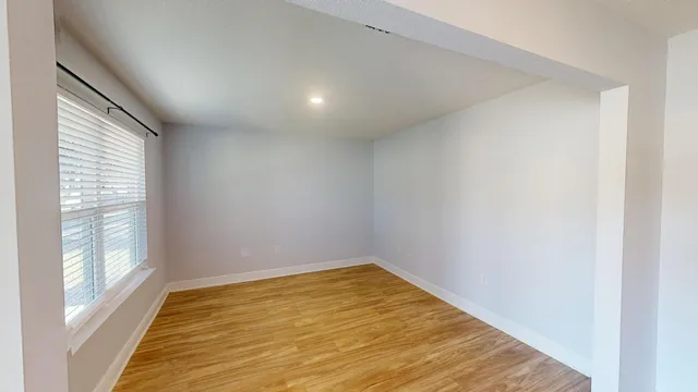 an empty room with windows