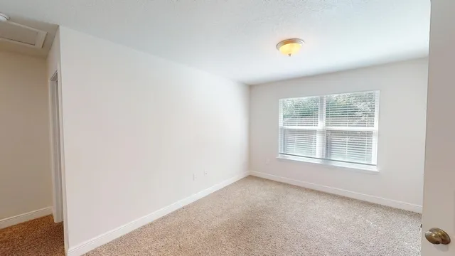 an empty room with a natural light