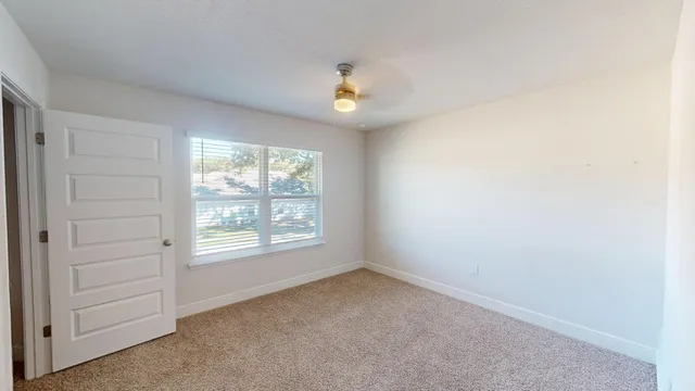 a view of small space with racks on the wall