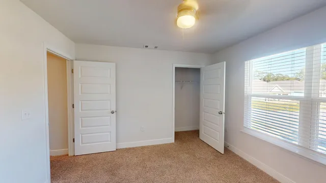 a view of a room with racks on the wall