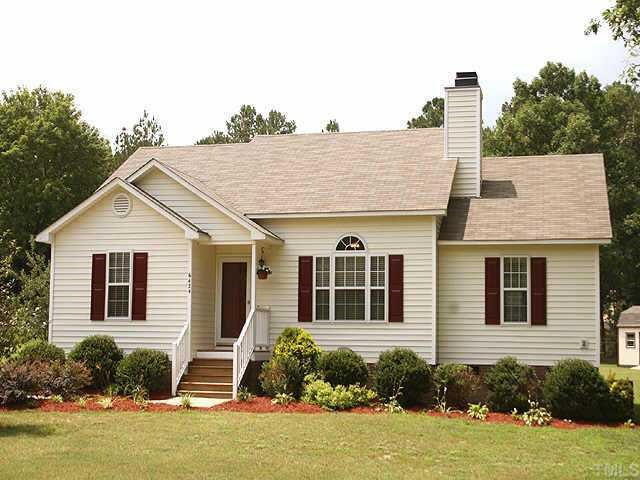 6424 Tinderbox Lane Raleigh, NC 27603 - Photo 1 of 10 Charming ranch nestled on private 2.25 acres of land, no neighbors to the right! Exterior Front