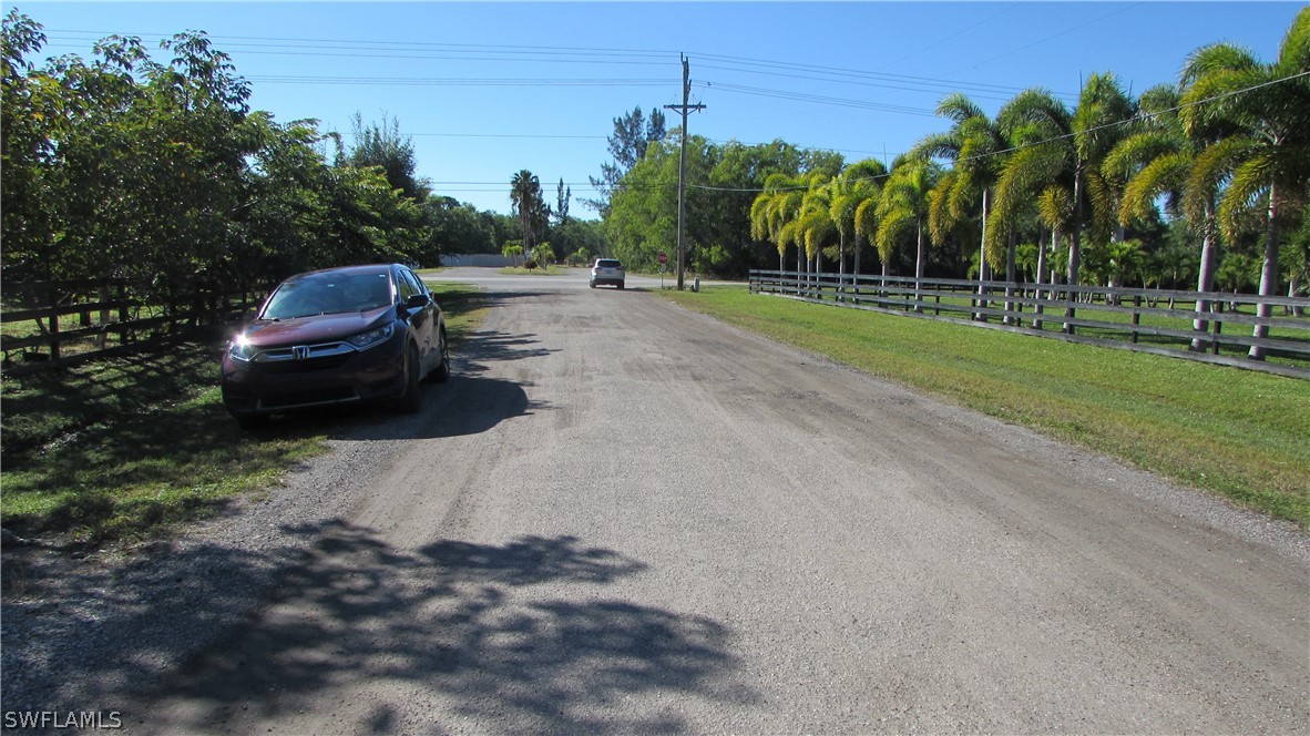 8390 Stringfellow Road St. James City, FL 33956 - Photo 33 of 35 a car parked on the side of the road