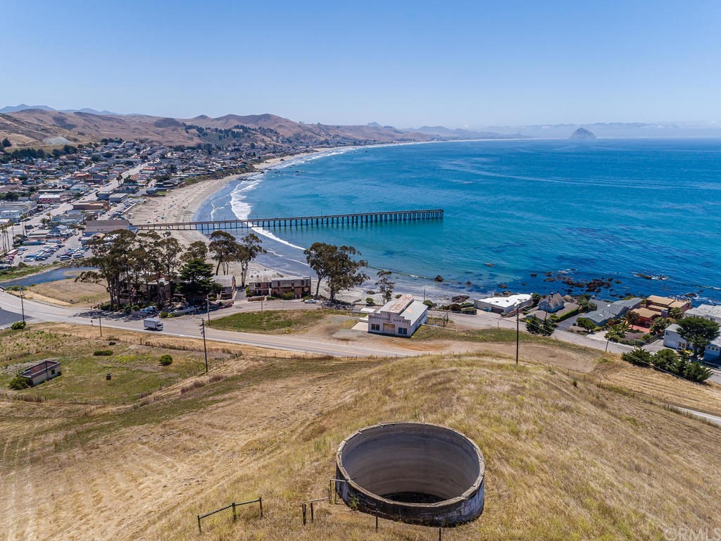 a view of a swimming pool and lounge chair