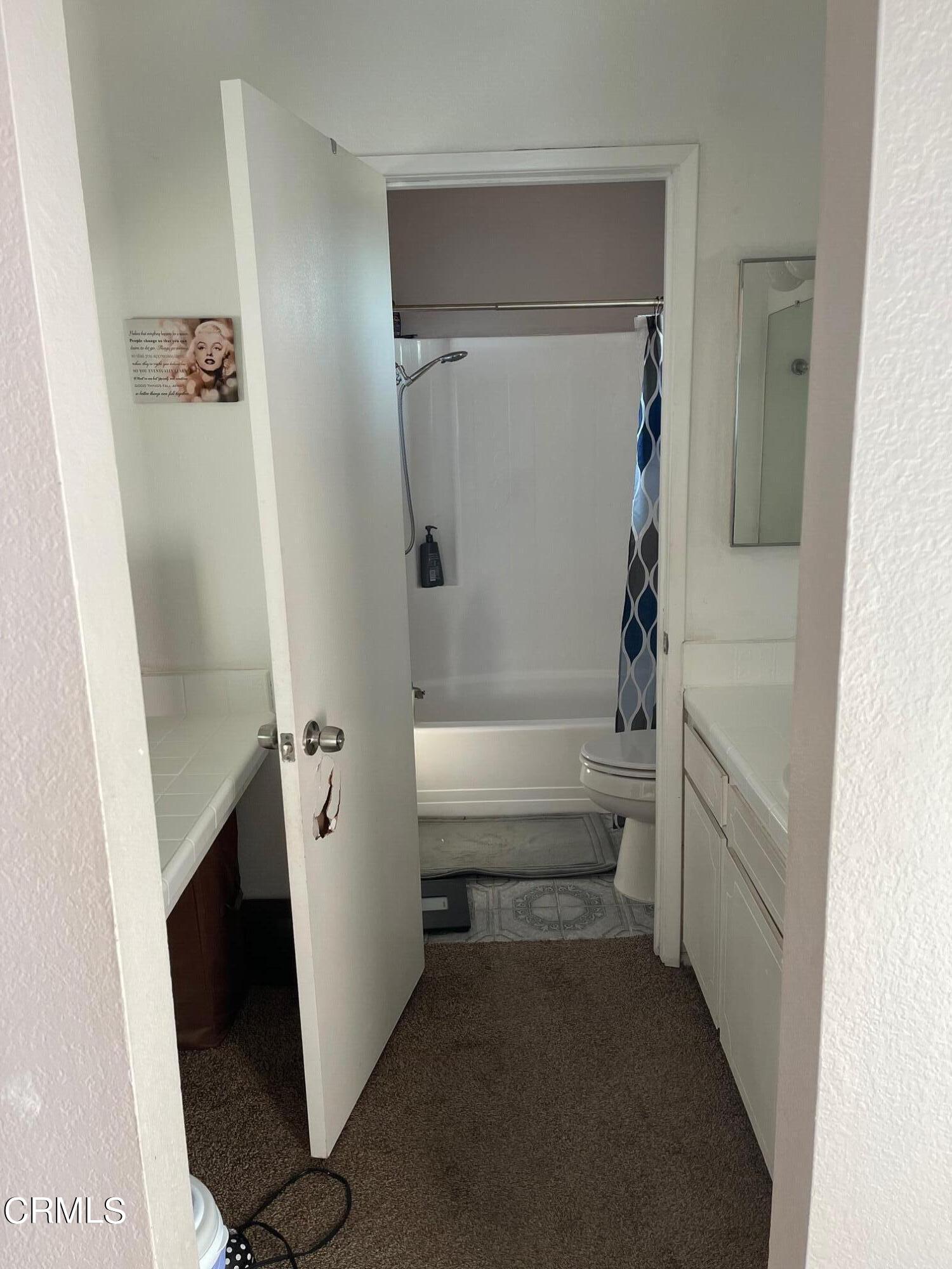 1831 Jetty Street Oxnard, CA 93035 - Photo 11 of 20 a bathroom with a bathtub and toilet