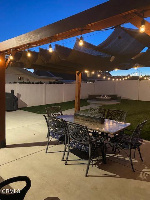 1831 Jetty Street Oxnard, CA 93035 - Photo 19 of 20 a view of a patio with a table and chairs