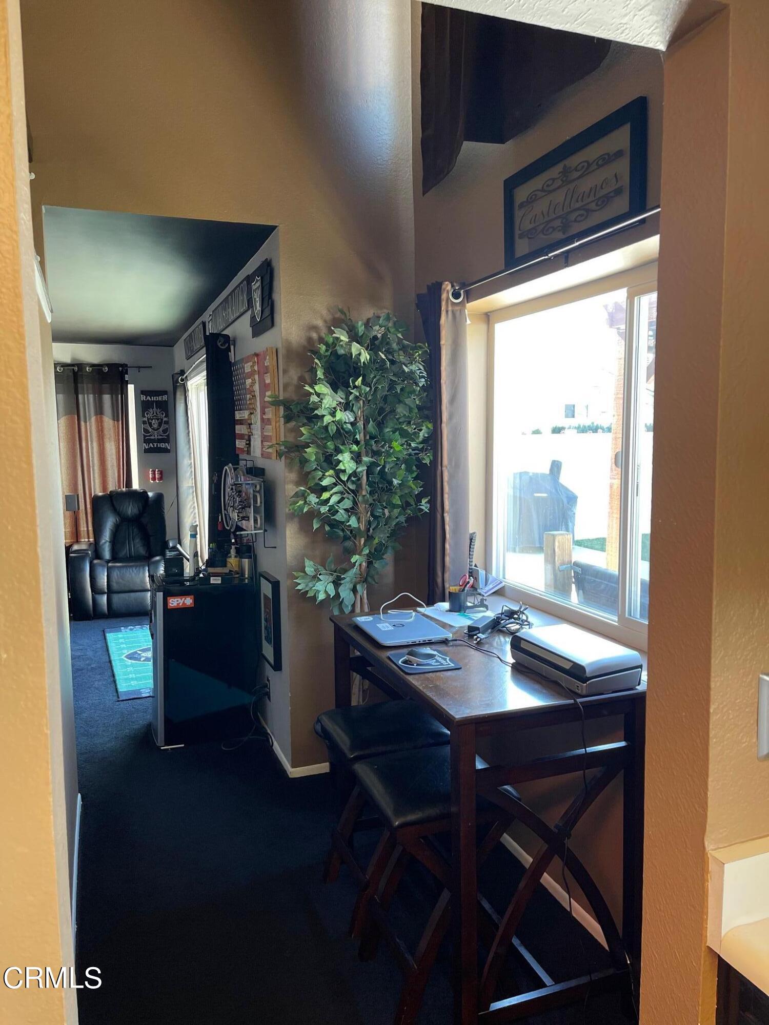 1831 Jetty Street Oxnard, CA 93035 - Photo 6 of 20 a view of a dining room with furniture and window