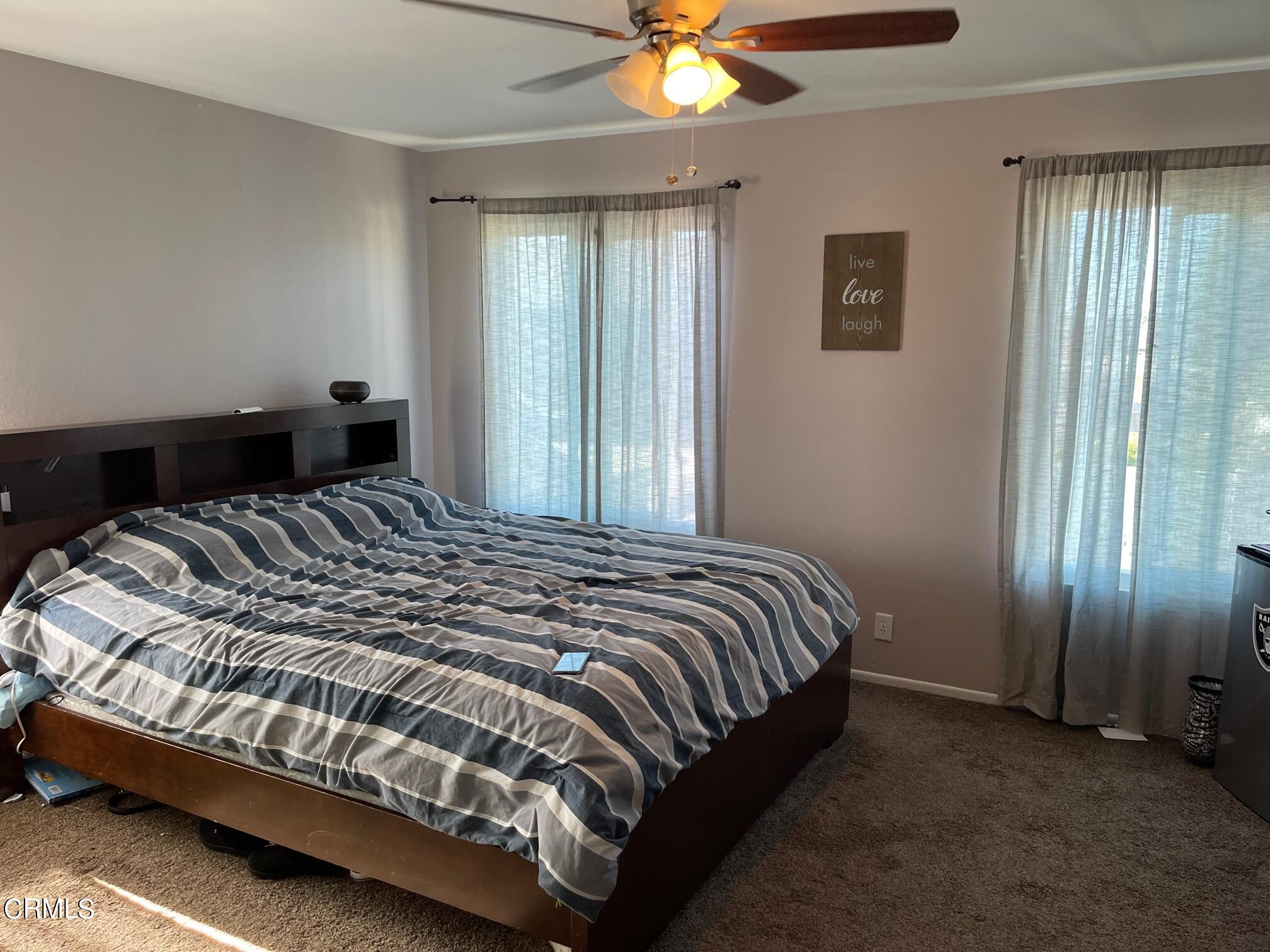 1831 Jetty Street Oxnard, CA 93035 - Photo 10 of 20 a bedroom with a bed and window