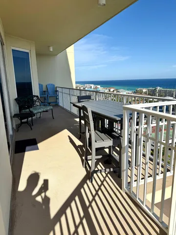 a view of a workspace with furniture