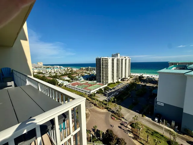 a view of balcony with wooden floor