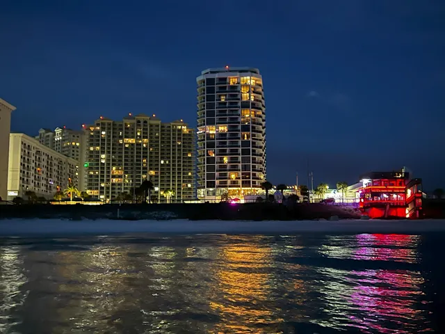 a view of swimming pool with a balcony