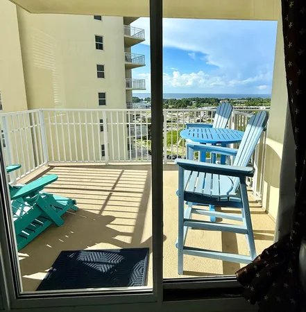 a view of a balcony with lake view