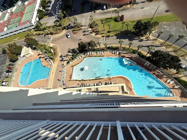 a view of a lake with outdoor seating space